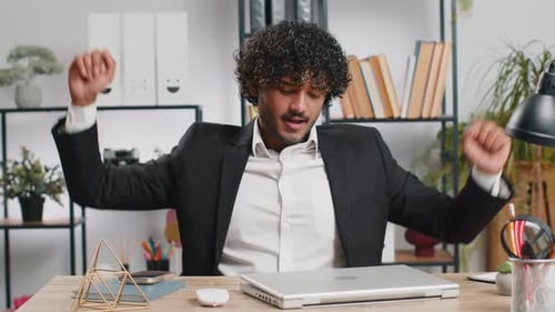 Indian Business Man Freelancer at Office Start Working on Laptop Computer Sends Online Messages