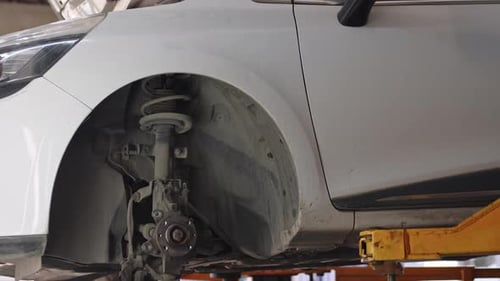 Unloading A Car Lift From A Car Repair Maintenance Service