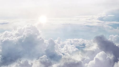 cumulus clouds, thick and bright clouds moving across the blue sky