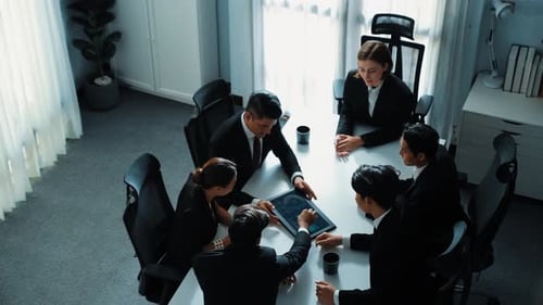 Top view of project manager present financial graph on tablet. Directorate.