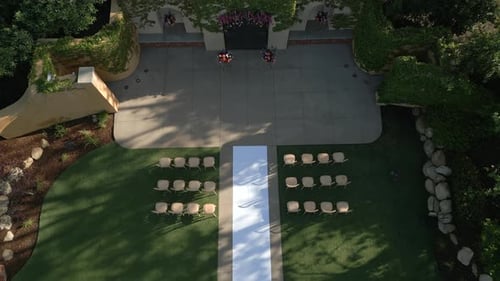 Aerial View of the Building and Decorated Place for Outdoor Wedding Ceremony