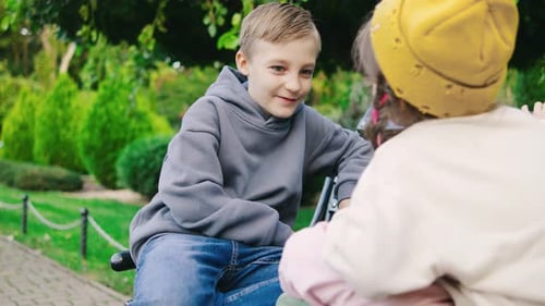 A Group of Children Joyfully Playing Together on a Sunny Park Bench Engaging in Delightful
