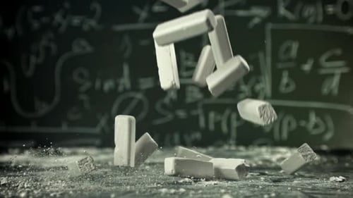 School Chalk Falls on the Desk Filmed on a Highspeed Camera at 1000 Fps