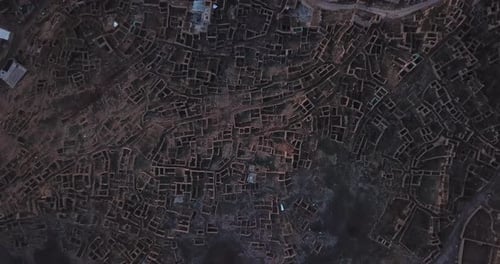 circle path of flying over ruins of historical village old town hilltop of a mountain summer season