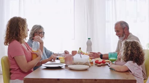 Family Gathering at Breakfast Table