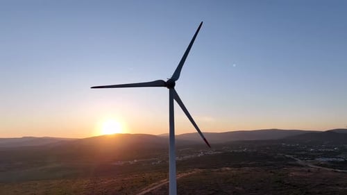 aerial view of wind mill on a sunny day