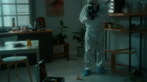 Person in Hazmat Suit Photographs Crime Scene