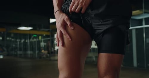 Strong Bodybuilder Male Demonstrate Quadriceps Muscles
