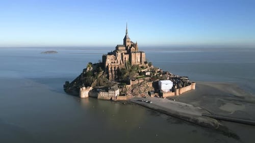 French Mont Saint Michel Castle in Normandy France, Aerial Drone Flying Around in Broad Daylight at