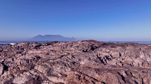Table Mountain reveal with ships in distance