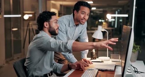 Investing, night and people with handshake in office, computer and celebration for investment