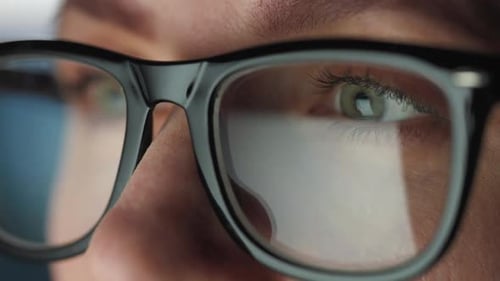 Glasses Reflecting Screen in Extreme Close-up