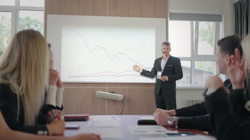 Business Presentation in Modern Office with Young Adults