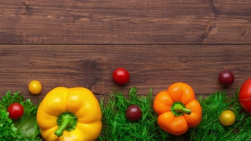 Fresh Vegetables and Herbs on Wooden Table