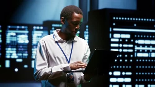 Admin Using Laptop to Audit Servers