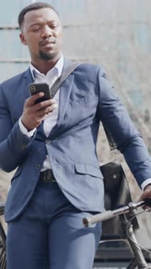 Phone, direction or businessman in city with bicycle, navigation or route instruction in morning