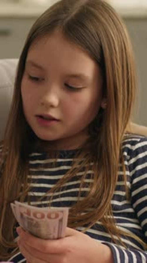 Caucasian Little Girl Child Kid Daughter Counting Cash Money Dollar Finance at Home Count Studying