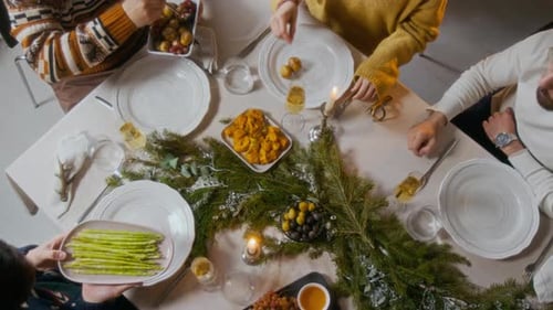 People Sharing Meal at Festive Table