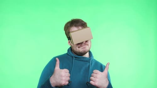 Man Wearing VR Headset on Green Screen Background