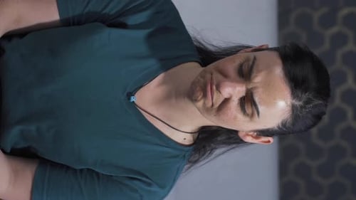 Close Up of Woman Grimacing in Pain