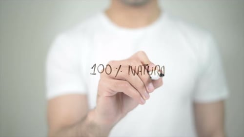 100 Percent Natural, Man Writing on Transparent Screen