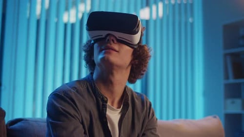 Young Adult Immersed in Virtual Reality Gaming