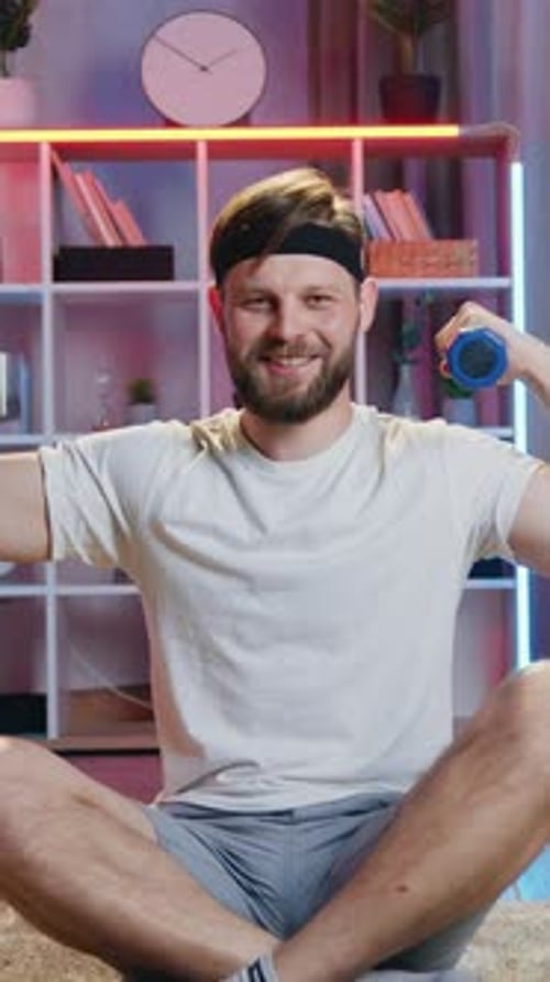 Portrait of Goodlooking Positive Sportive 30Aged Bearder in Training Clothes and Black Headband