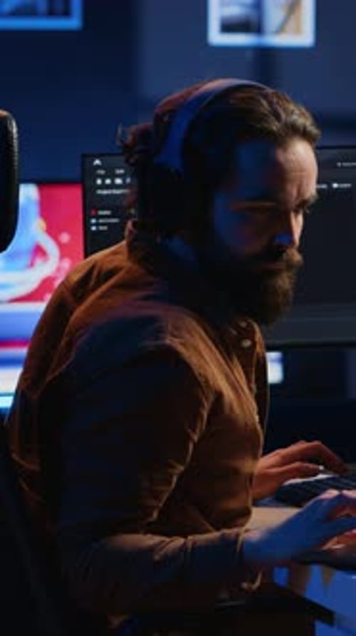 Fatigued Developer Working Overnight at Home Rubbing Eyes While Taking Break