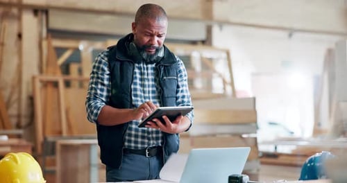 Black man, engineer and workplace with tablet for building ideas, plans and design online