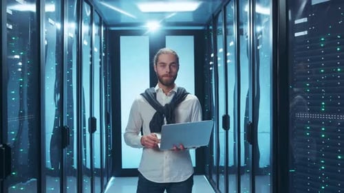 An IT Technician Engaged in Operations at a StateoftheArt Modern Data Center Facility