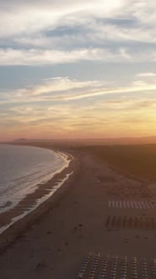 Vertical Video of sunset on the beach in Monte Gordo. Algarve, Portugal