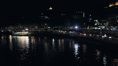City at Night with Reflecting River