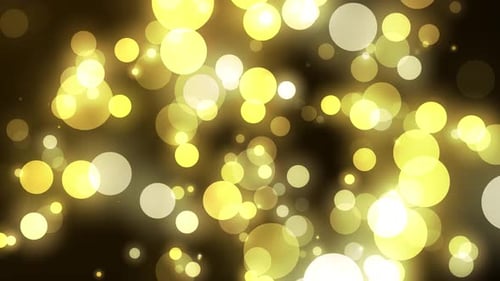 Golden Shimmering Bokeh Lights Particles Background