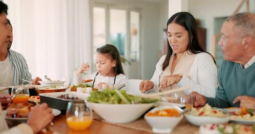 Family Togetherness Enjoying a Meal at Home
