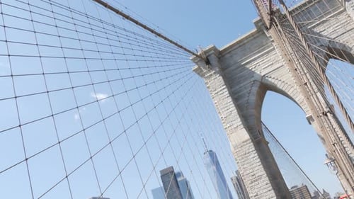 Brooklyn Bridge to Manhattan Downtown Cables and Blue Sky New York City Iconic Symbol Travel USA