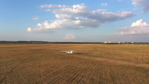 Small Airplane Riding Along Rural Runway Before the Takeoff Light Aircraft Heading Towards Airstrip