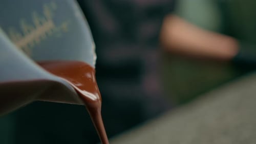 Pouring Melted Chocolate into Candy Mold
