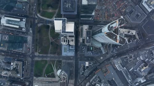 Aerial Birds Eye Overhead Top Down Panning View of Downtown Skyscrapers in Financial and Economic