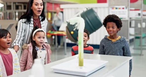 Science, teacher and chemistry experiment in classroom with excited children learning