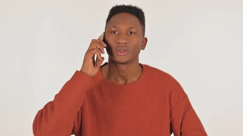 Young Man Talking on Mobile Phone