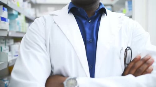 Happy black man, pharmacist and arms crossed of professional in healthcare