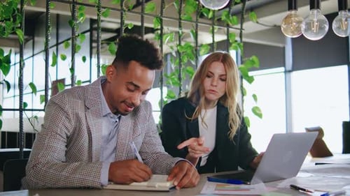 Professionals Working Together in a Modern Office