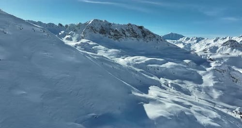 Snowy Mountains Aerial View on a Bright Day