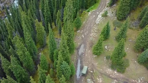 Aerial view of cab vehicle driving on a mountain road