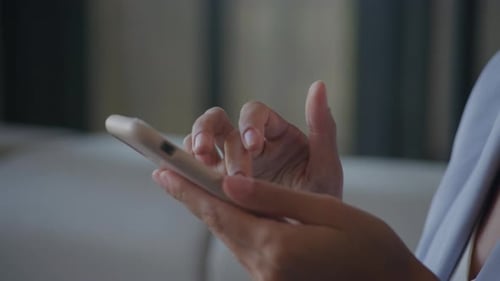Businesswoman Hands Browsing on Smartphone Extreme Close Up