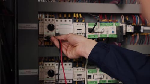 Electrical Panel Maintenance with Voltage Meter