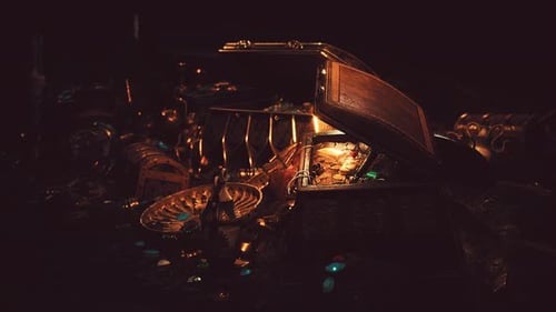 Open Old Wooden Chest with Many Treasures
