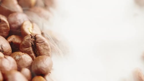 Roasting Coffee Beans with Smoke on Dark Background Close Up Arabica Robusta Colombian Beans