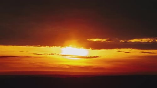 Majestic Sunset with Dramatic Cloudscape and Golden Light