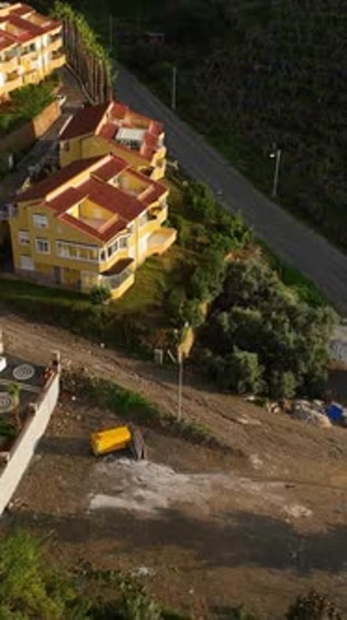 Vertical Video Above the Luxe Enclave Aerial View of Elegant Homes and Villa Complexes with Pools